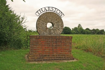 Tharston village sign